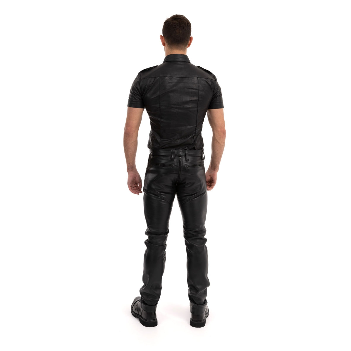 Full length rear view of Prowler RED Rider Leather Jeans on a male fetish model.