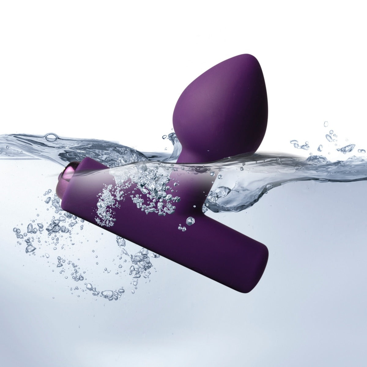 Rocks Off Astryx Rechargeable Plug Purple submerged in water