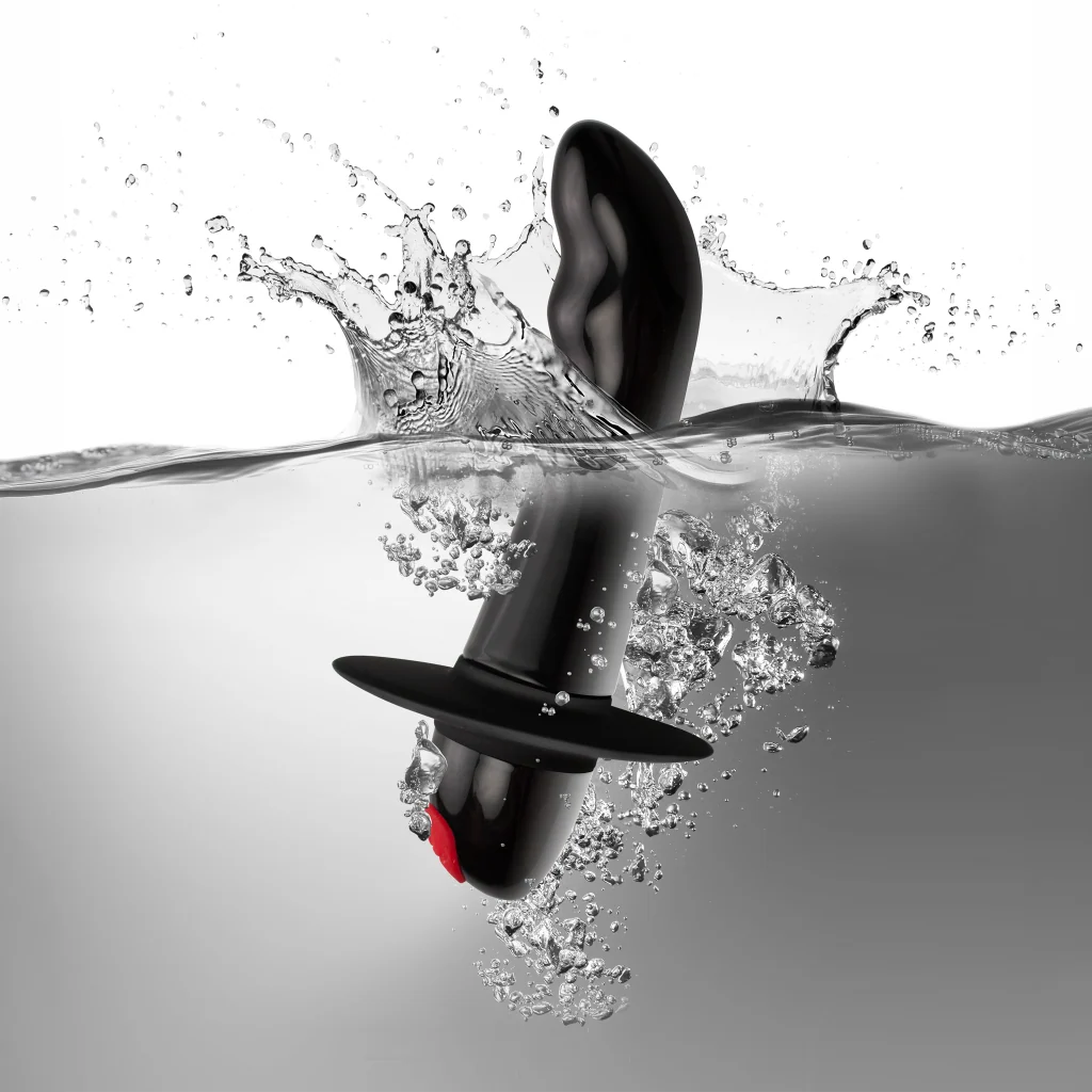 Graphic showing Rocks Off Quest Prostate Bullet Vibrator in water to illustrate waterproof capability