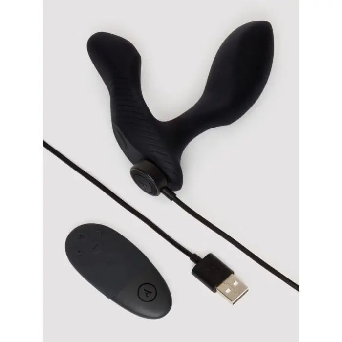 Arcwave Perk Prostate Massager with Remote Control box contents against a white background
