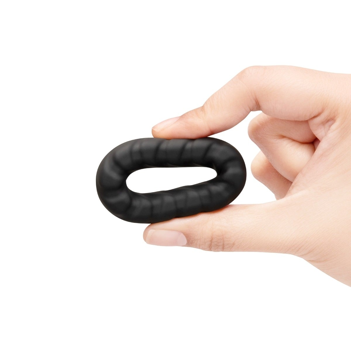 Fingers squeezing b-Vibe FLEX RING TREAD - SILICONE COCK RING to show elasticity