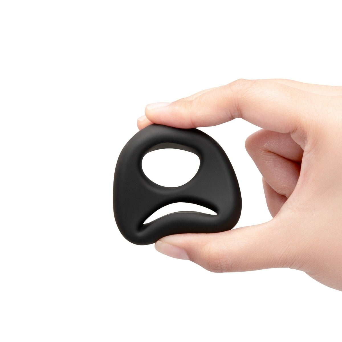 Hand squeezing a b-Vibe FLEX RING EIGHT - SILICONE COCK RING 