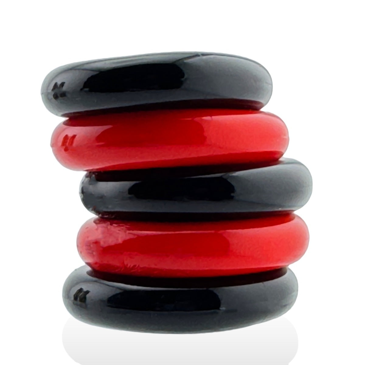 Stack of Hünkyjunk Jacker 5-Stack Cock Rings 5-Pack Red/Black side view