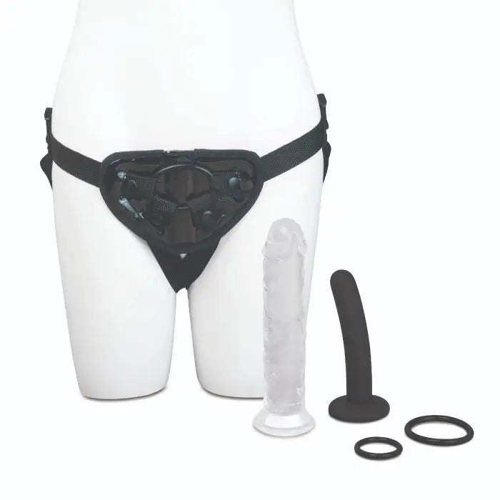 Black Me You Us Complete Strap-On Harness Kit with silicone ring and two dildos on a white background