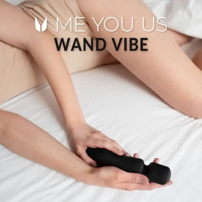 Model holding Me You Us Wand Vibrator Black 