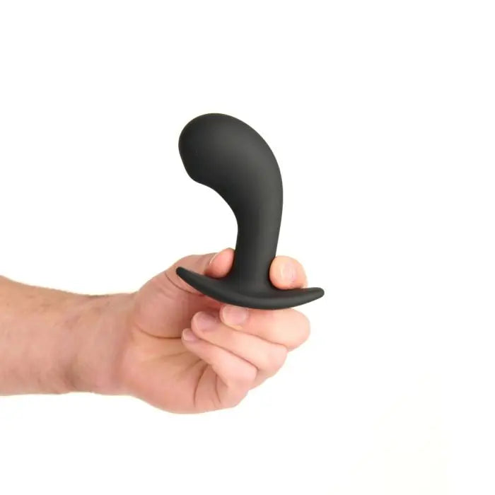 Prowler RED P-Spot Rechargeable Plug with Remote held by a model