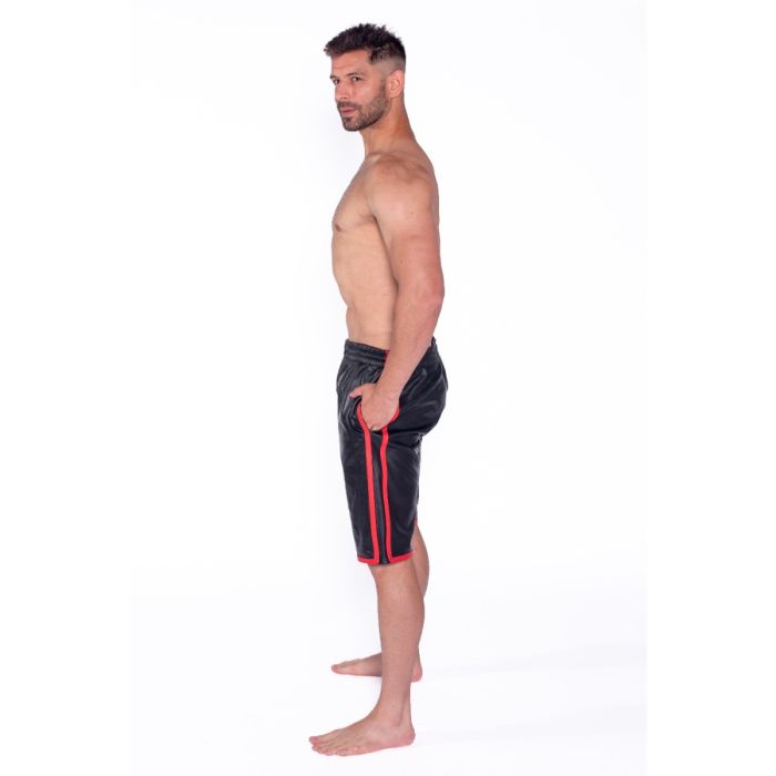 Side View of Prowler RED Leather Long Sports Shorts Black/Red worn by a topless male model.