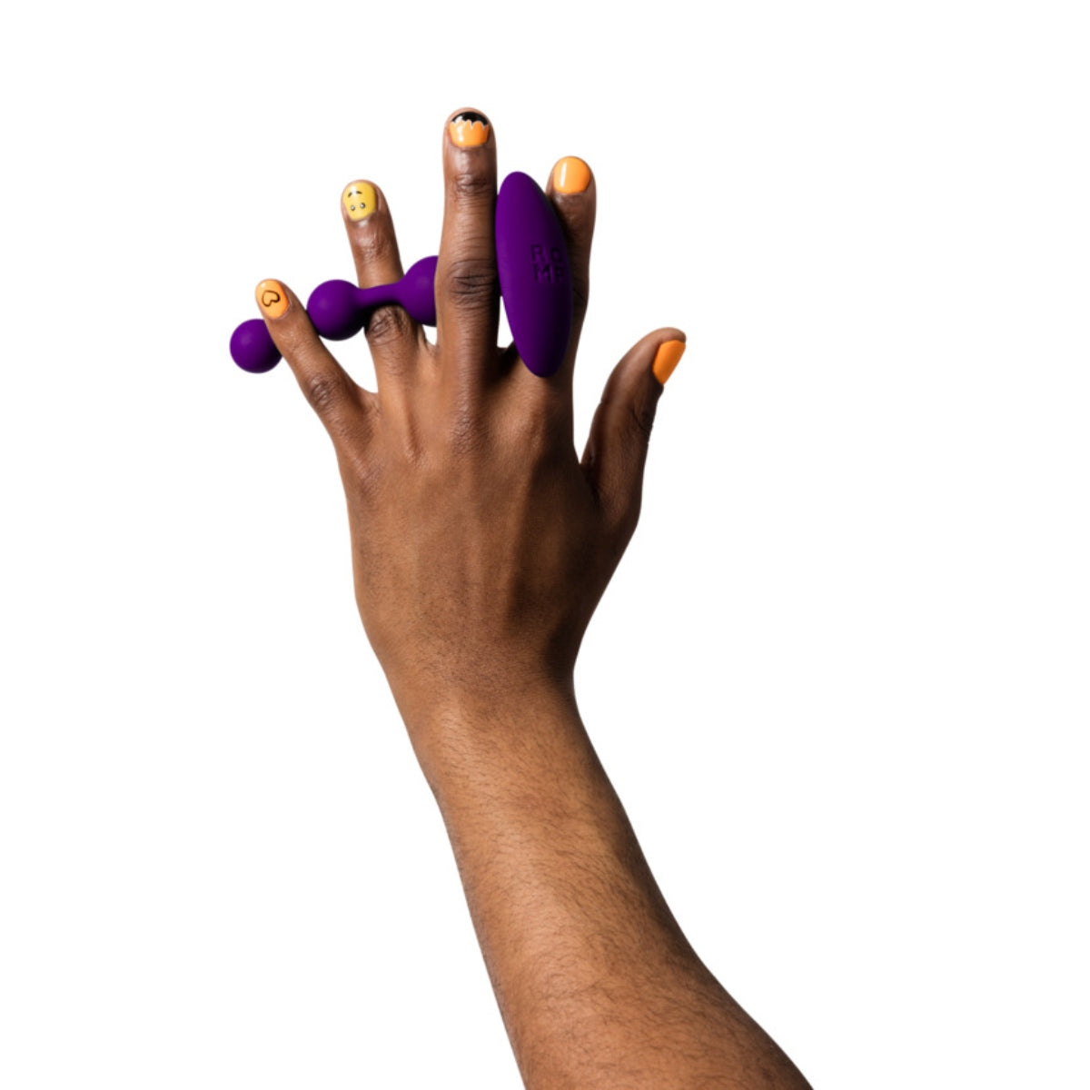 ROMP Amp Anal Beads Purple held between fingers of model