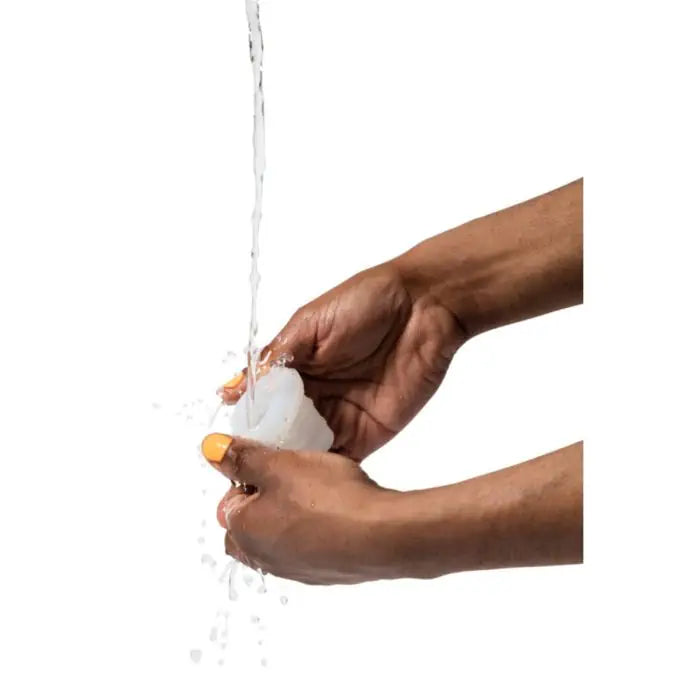 ROMP Mosh blowjob stroker being rinsed under running water easy clean TPE